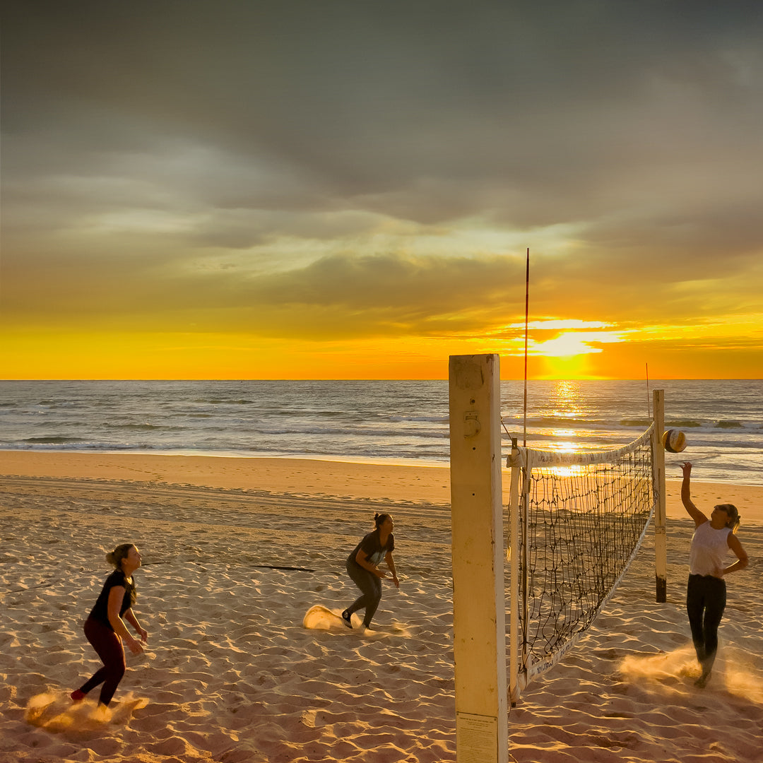 Beach Volleyball as the sun rises across Manly Beach, Sydney, Australia