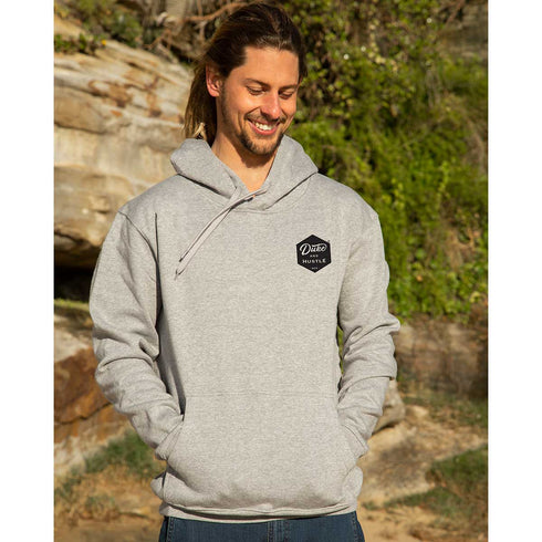 The Six Sider, our Duke & Hustle Pocket Logo Fleece Hoodie, Grey Marle, front, modelled by Oliver