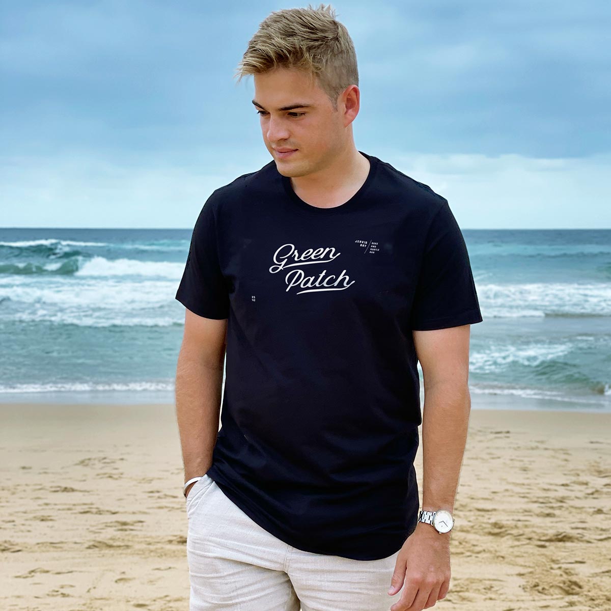 "The Return Loop" Green Patch Men’s Long Curve Tee, khaki, modelled by Tim