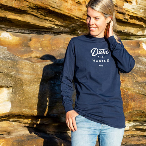 Unisex Duke and Hustle Logo Long Sleeve Tee on Australian Cotton, Navy, Front, full length womens model