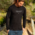 Men’s Long Sleeve Cotton T Shirt with Freshwater Beach graphic design, Black, Front, on male model