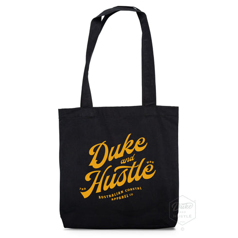 Premium cotton tote bag, Black, with typographic design reading "Duke and Hustle"