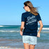 Classic Fit Unisex T Shirt, Retro Type, Light Blue Print on Navy Cotton, Back, modelled by Em