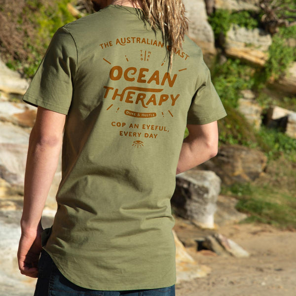 The Deep See, Men’s Long Curved Hem Graphic T Shirt, Khaki, Back, modelled