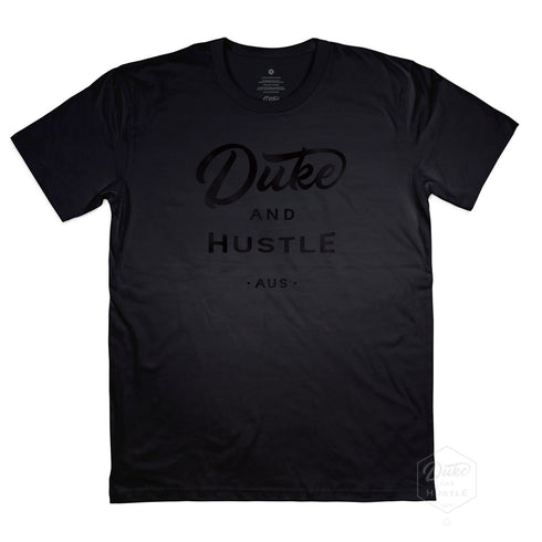 Front side, Black Duke & Hustle Logo on Black Classic Fit Cotton Tee, Flat lay