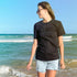 Front side, Black Duke & Hustle Logo on Black Classic Fit Cotton Tee, worn by Emma