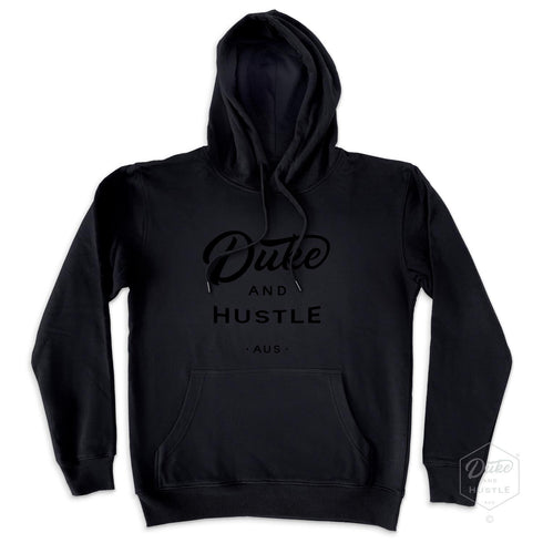Black Vinyl Duke and Hustle Logo, on a Black Hoodie, front, flat lay