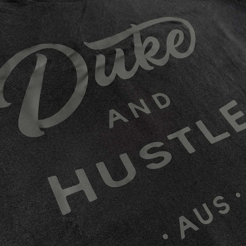 Unisex Long Sleeve Tee from the Double Black sereies, black vinyl logo on black cotton, Close Up