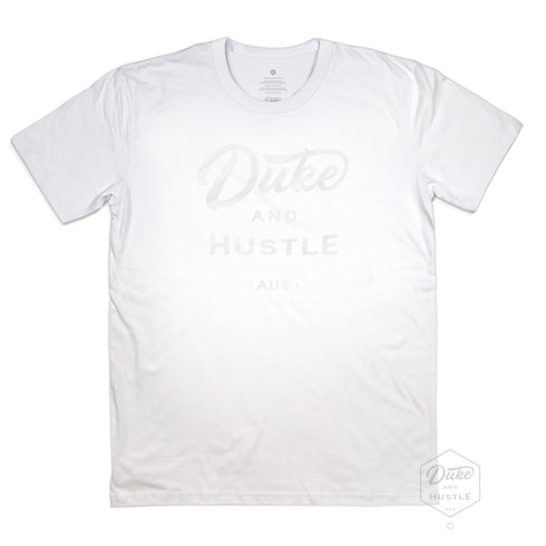 White Duke and Hustle Logo on white cotton, our classic fit t shirt "The Flat White", front