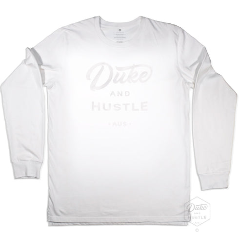 The Flat White, white vinyl D&H logo on a white 100% cotton long sleeve unisex fit tee, front